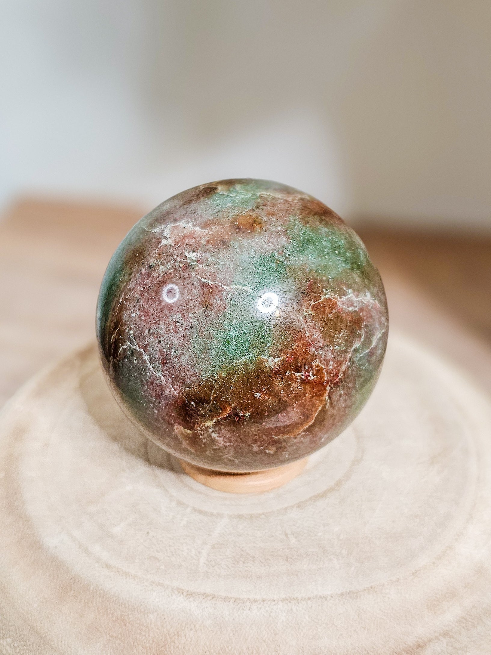Natural Eclogite sphere highlighting garnet and omphacite mineral composition and dense texture