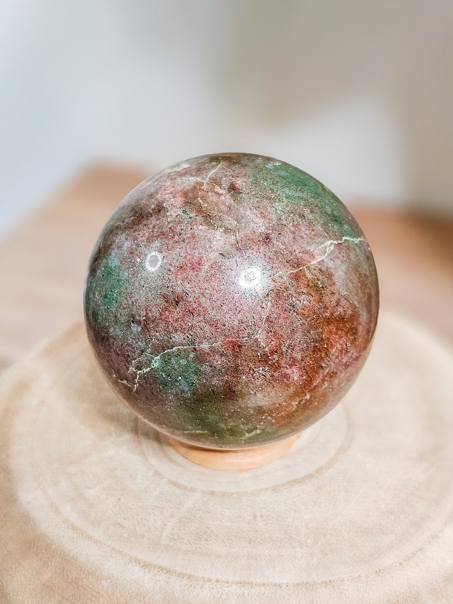 Natural Eclogite sphere highlighting garnet and omphacite mineral composition and dense texture