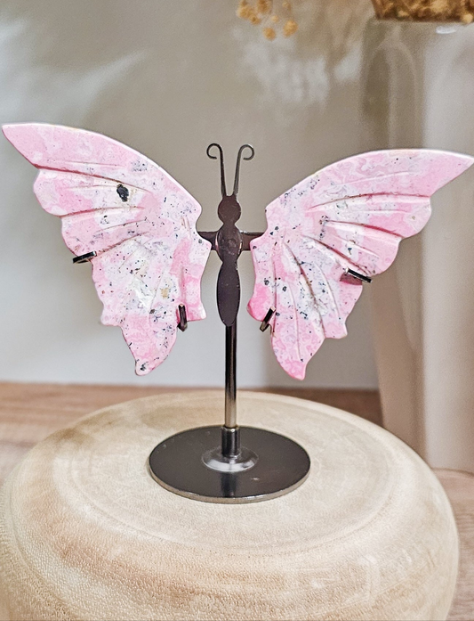 Peruvian Rhodonite butterfly wings on stand, carved pink rhodonite with natural dark veining and delicate wing shape