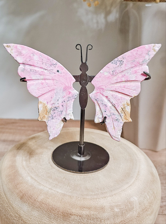 Peruvian Rhodonite butterfly wings on stand, carved pink rhodonite with natural dark veining and delicate wing shape
