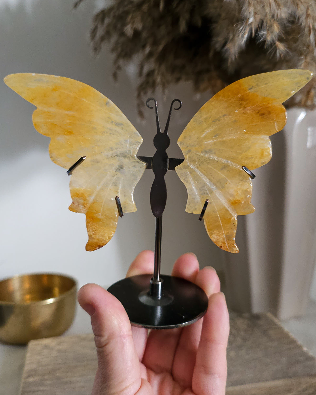 Golden Healer Quartz Butterfly Wings On The Stand