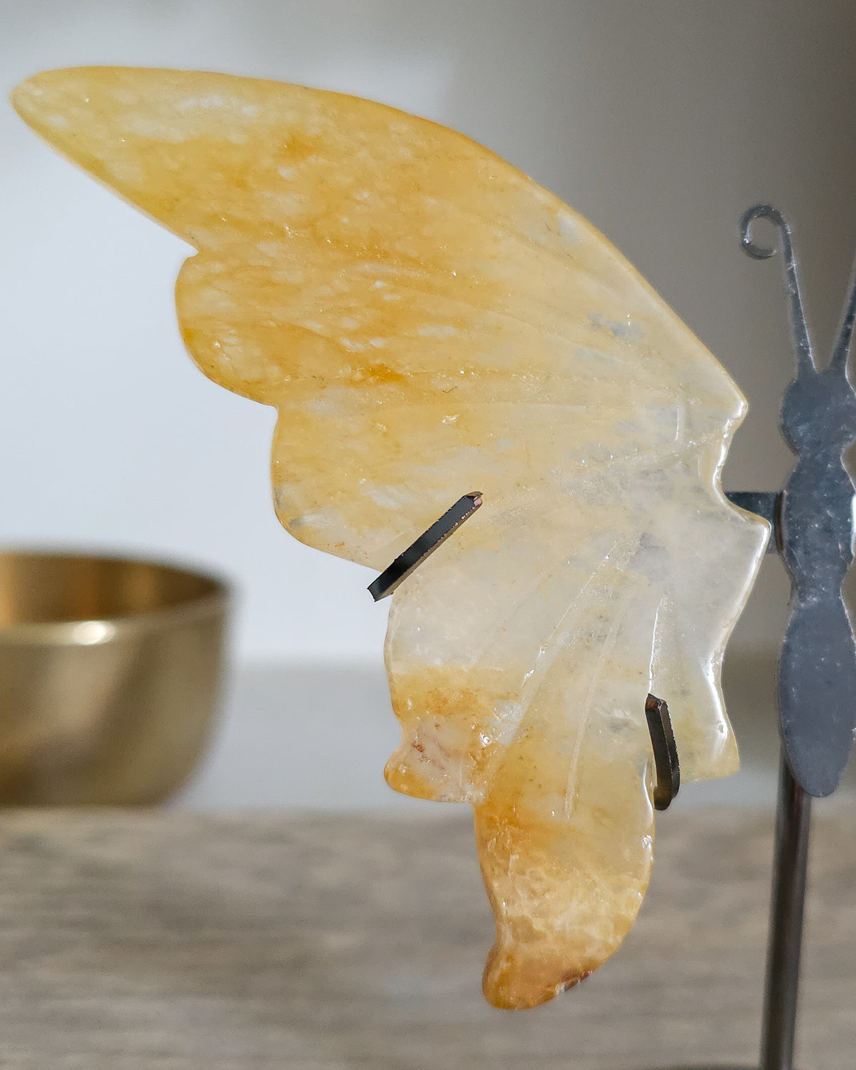 Golden Healer Quartz Butterfly Wings On The Stand