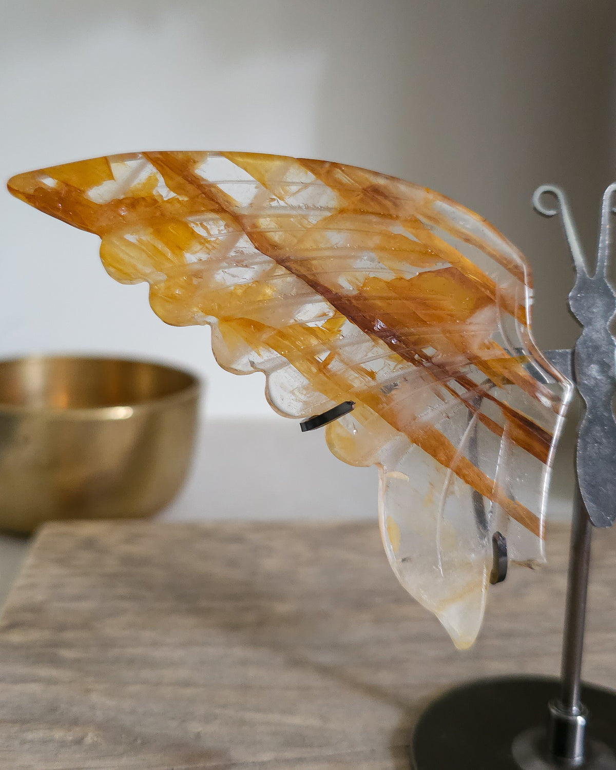 Golden Healer Quartz Butterfly Wings On The Stand
