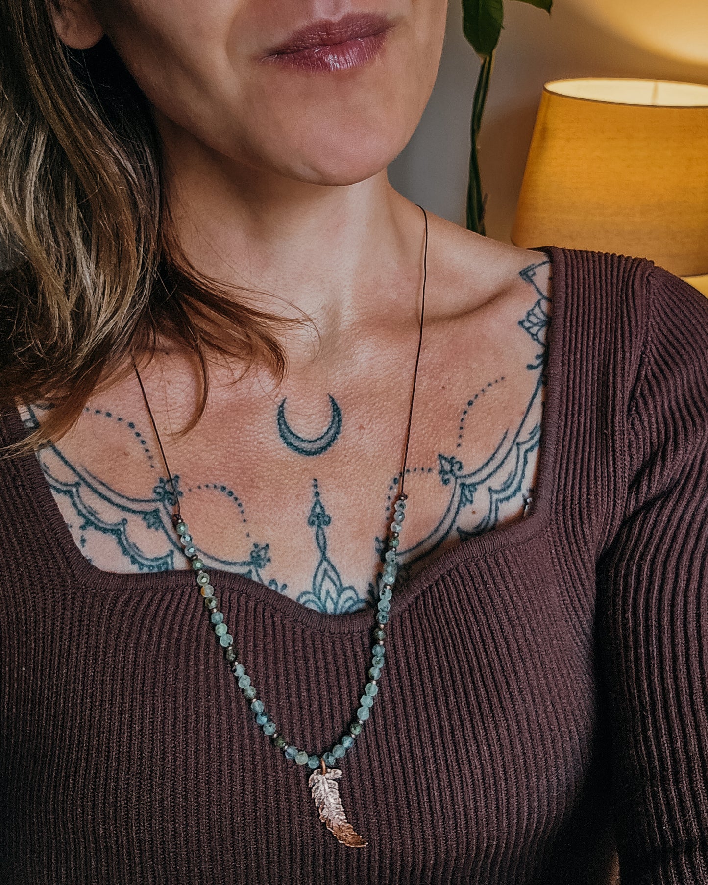 Woman wearing Necklace with copper electroformed fern leaf pendant and crystal Prehnite and Epidote beads 