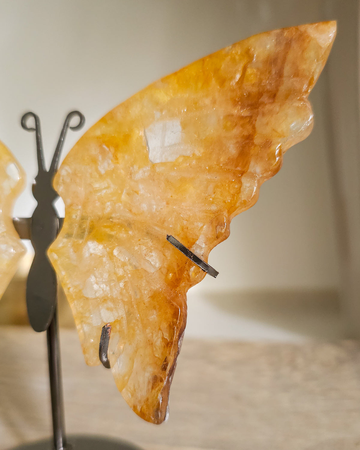 Golden Healer Quartz Butterfly Wings On The Stand