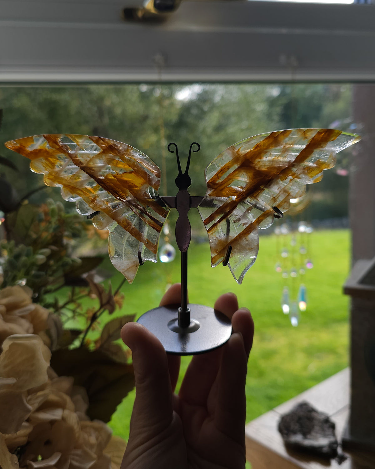 Golden Healer Quartz Butterfly Wings On The Stand
