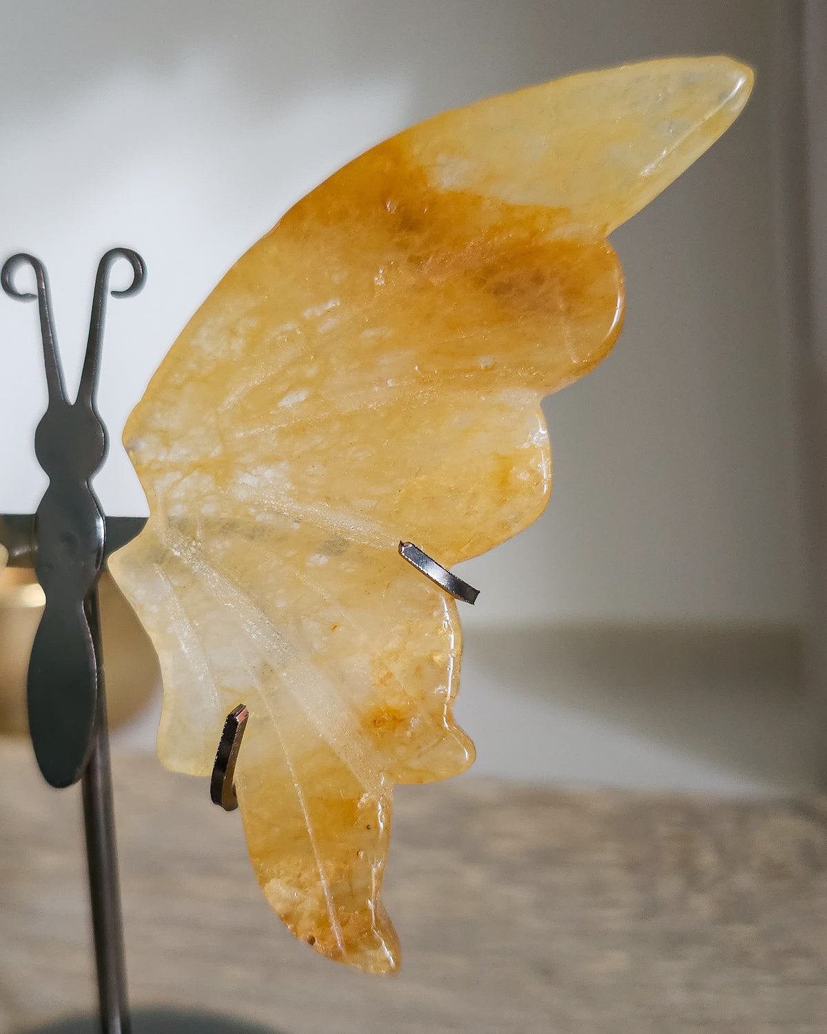 Golden Healer Quartz Butterfly Wings On The Stand