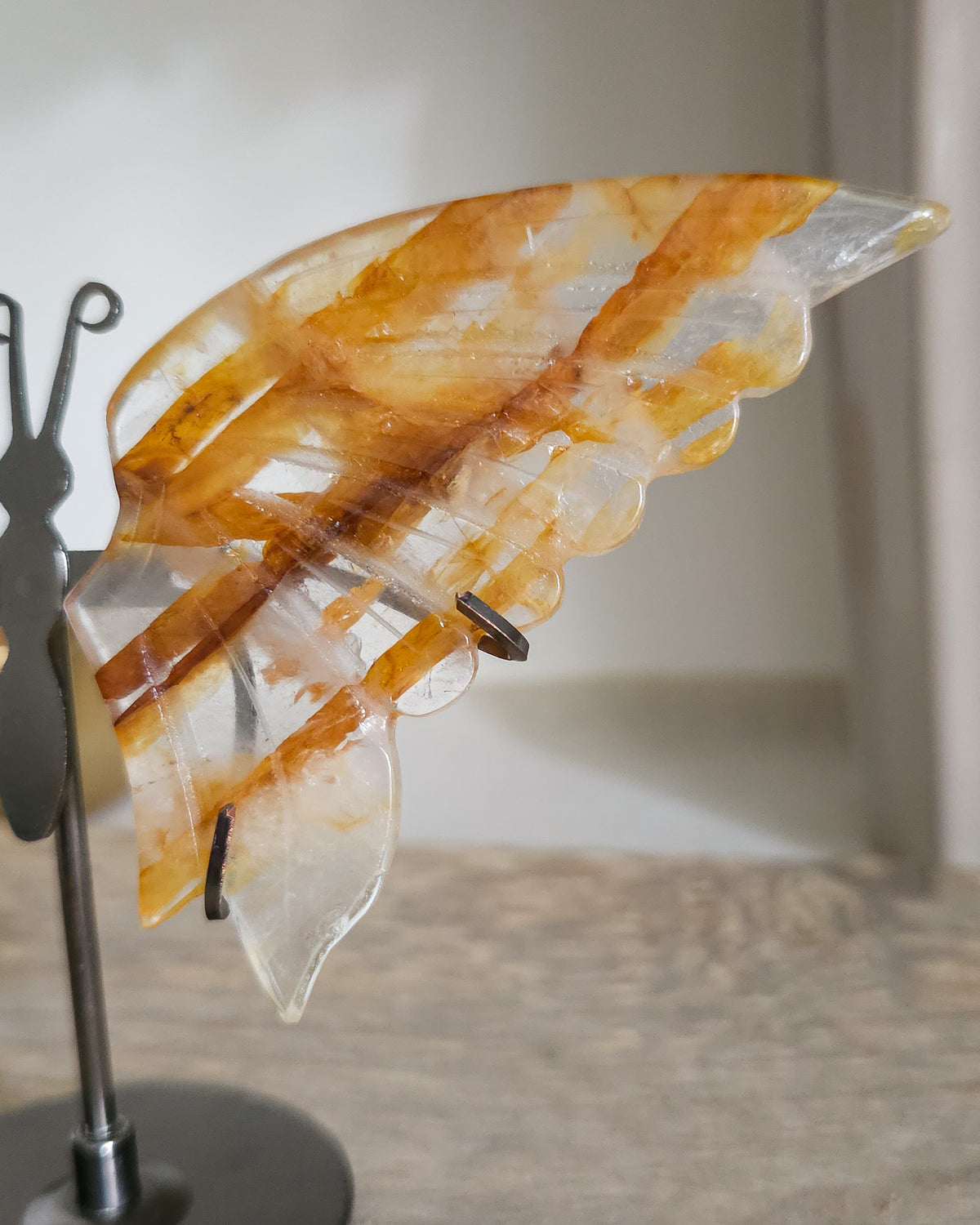 Golden Healer Quartz Butterfly Wings On The Stand