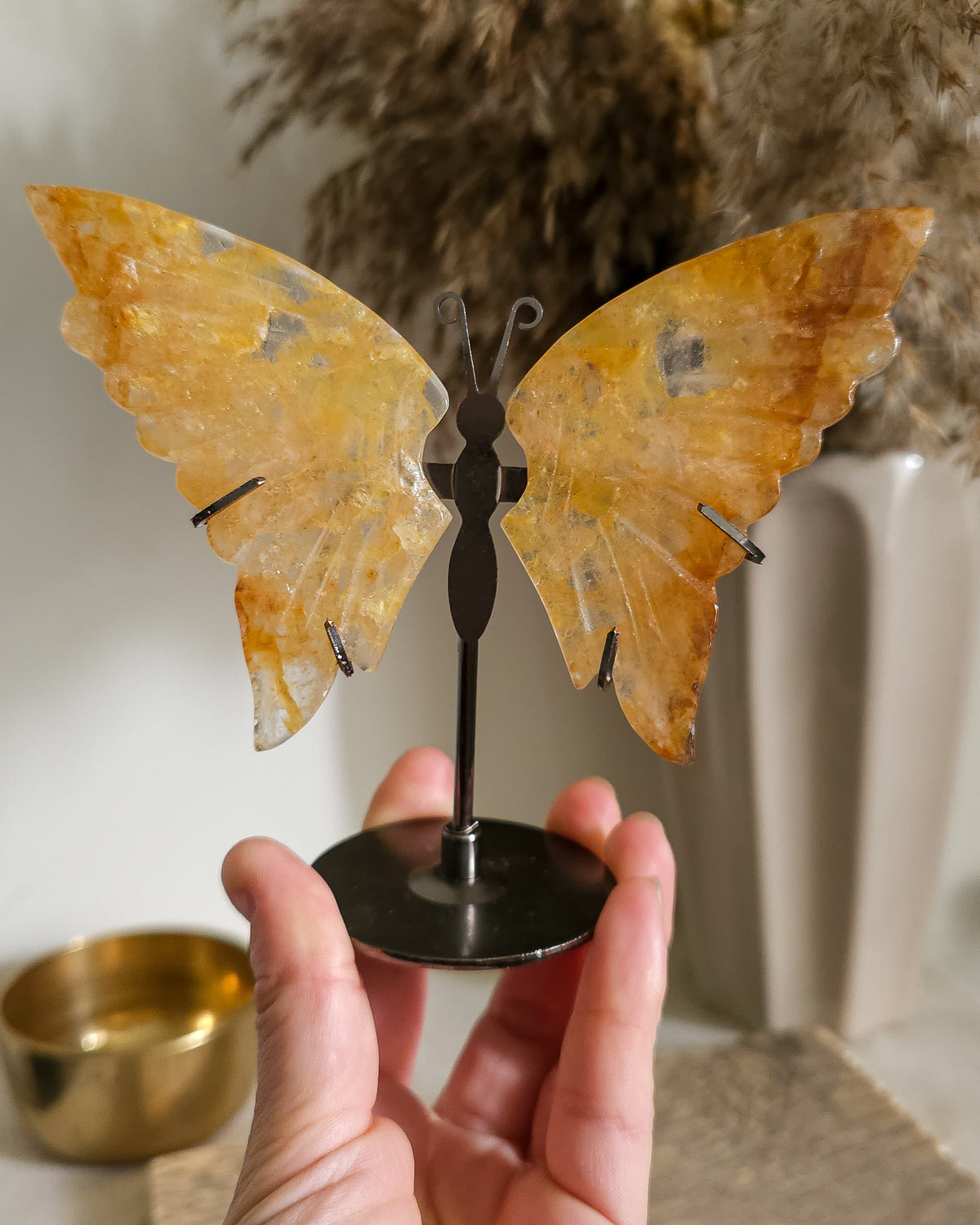 Golden Healer Quartz Butterfly Wings On The Stand