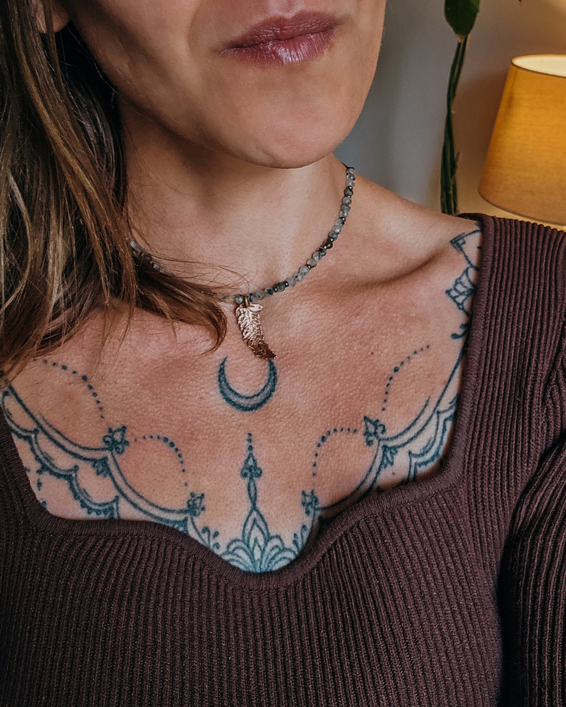 Woman wearing Necklace with copper electroformed fern leaf pendant and crystal Prehnite and Epidote beads 