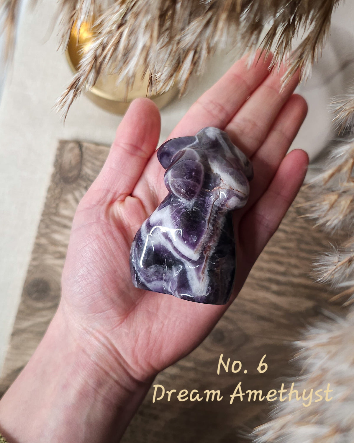 Crystal Goddess body carvings in Dream Amethyst, showing natural colours and patterns.
