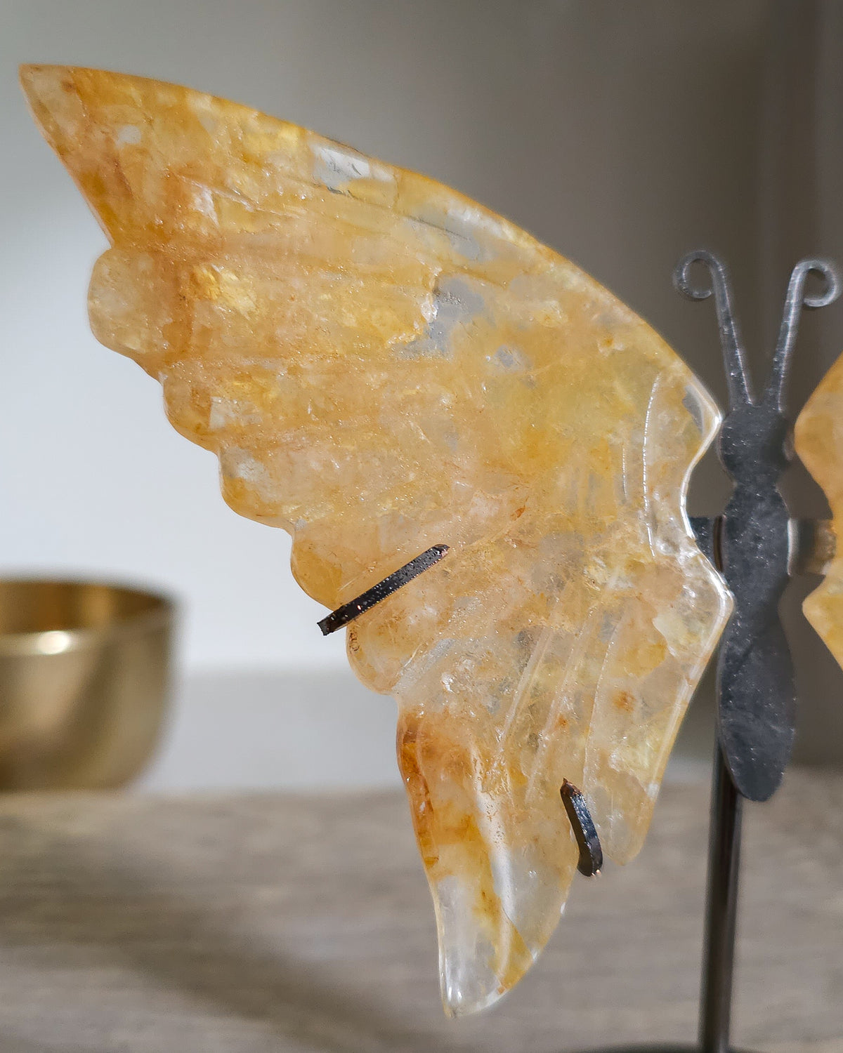 Golden Healer Quartz Butterfly Wings On The Stand