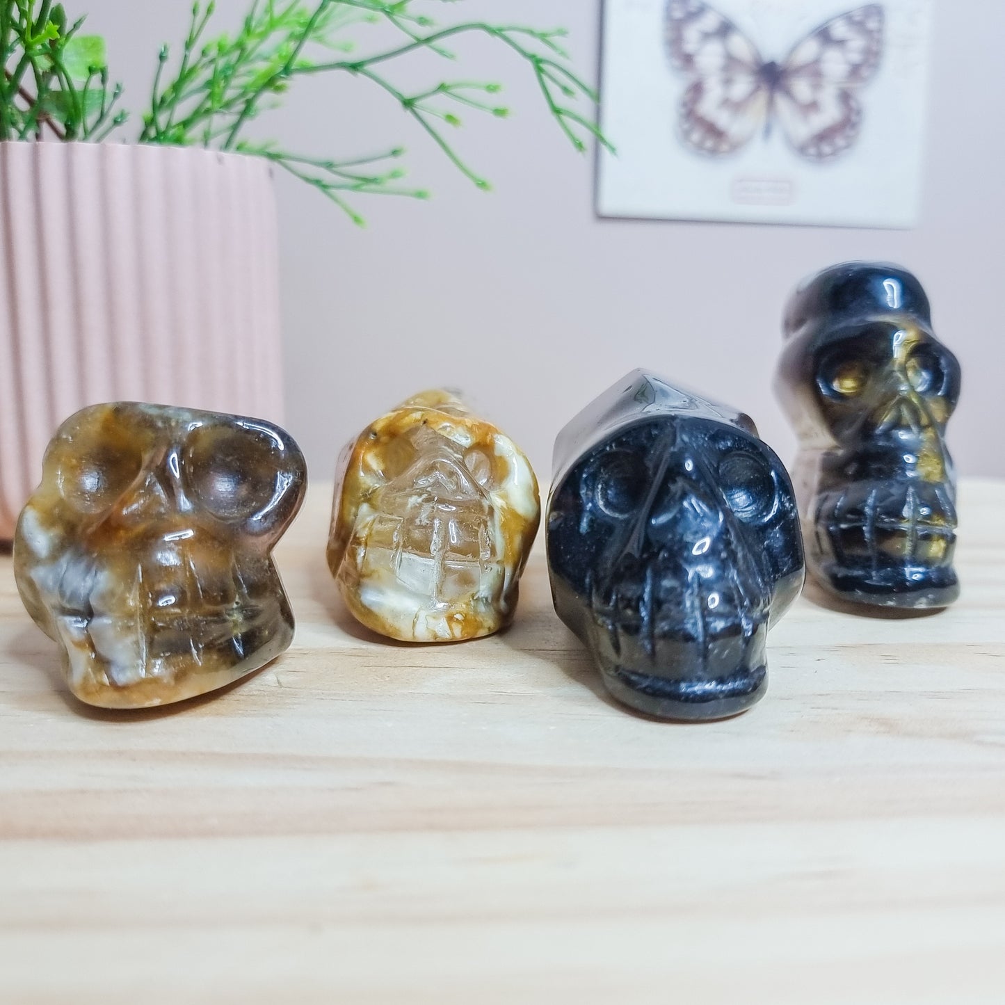 Golden Healer and Smoky Quartz Skulls
