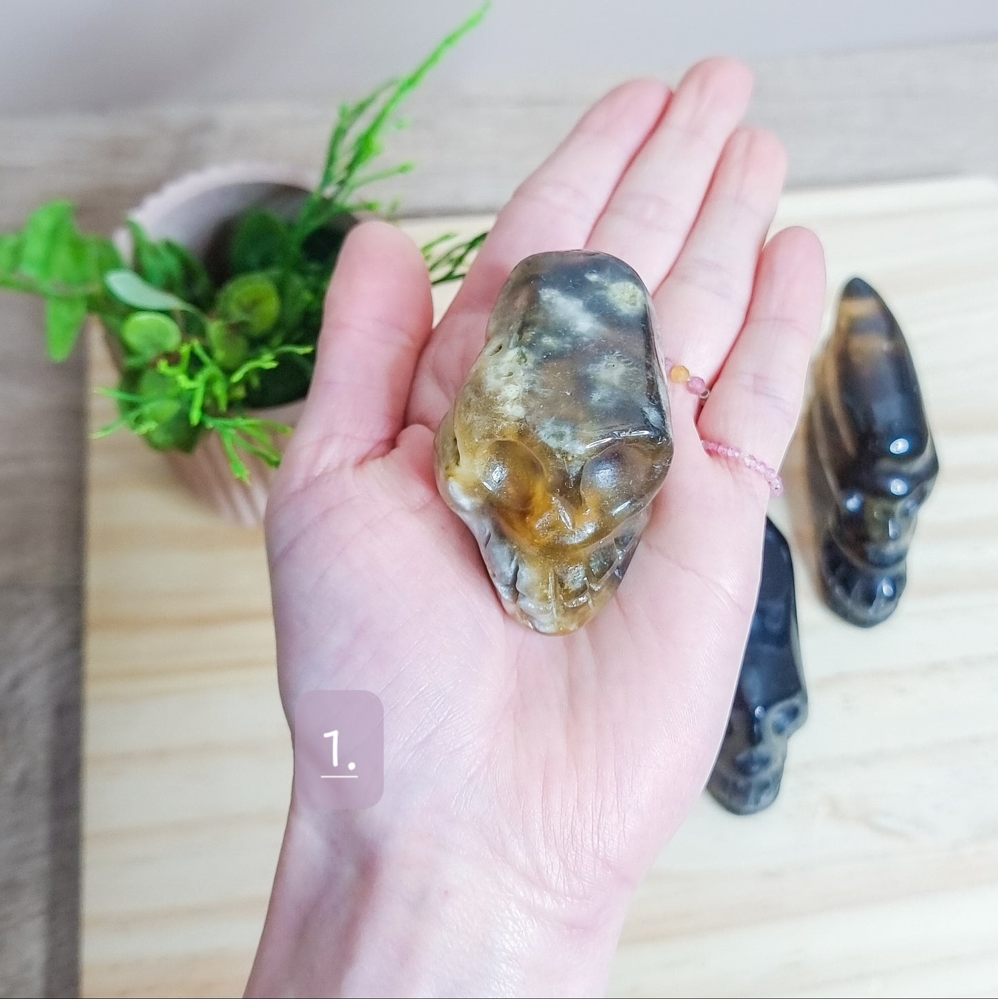 Golden Healer and Smoky Quartz Skulls