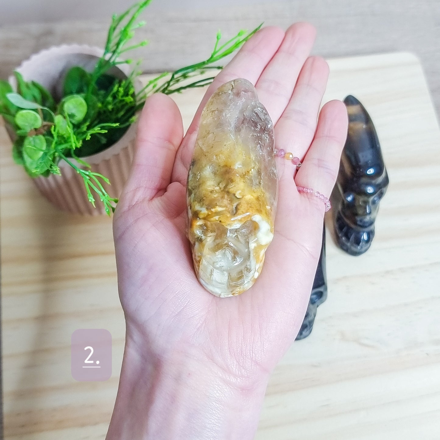 Golden Healer and Smoky Quartz Skulls