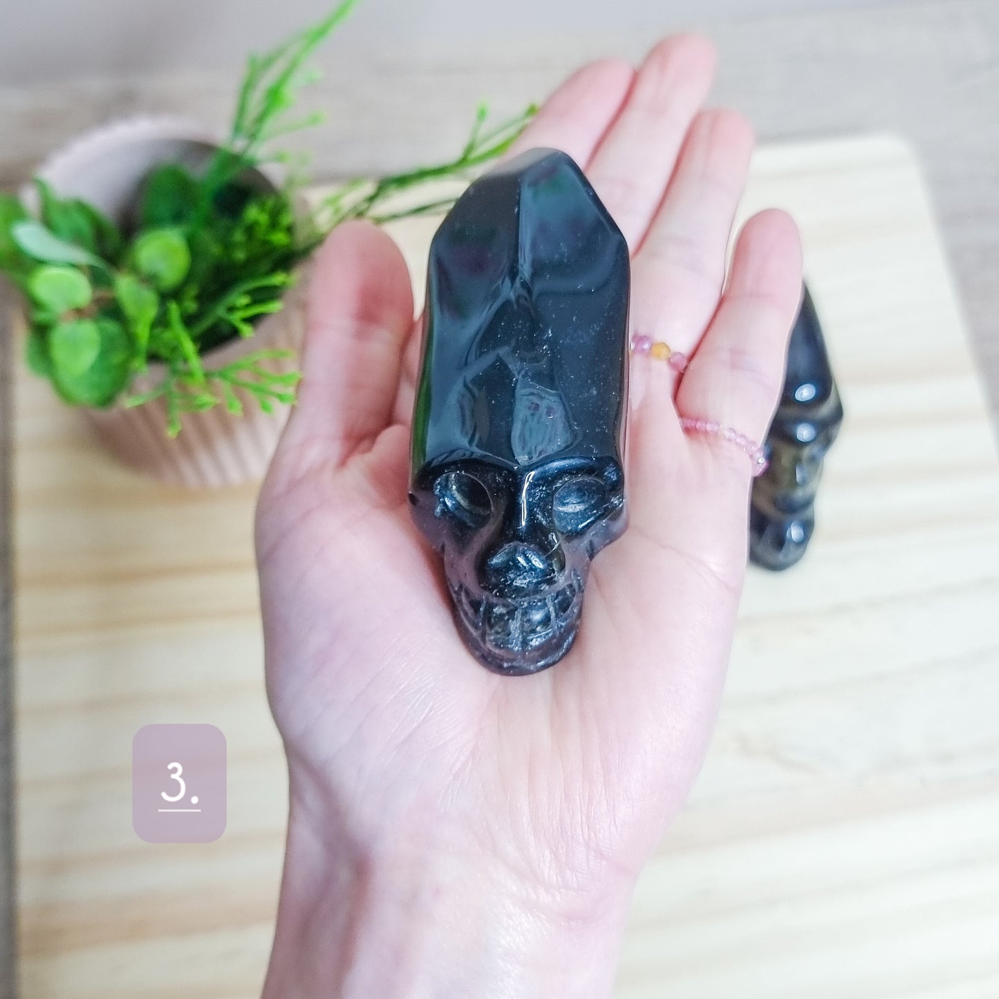 Golden Healer and Smoky Quartz Skulls